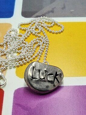 Necklace vintage Todd Oldham Button 90s Silver tone LUCK carving lucky pebble